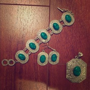 Silver set with green stones